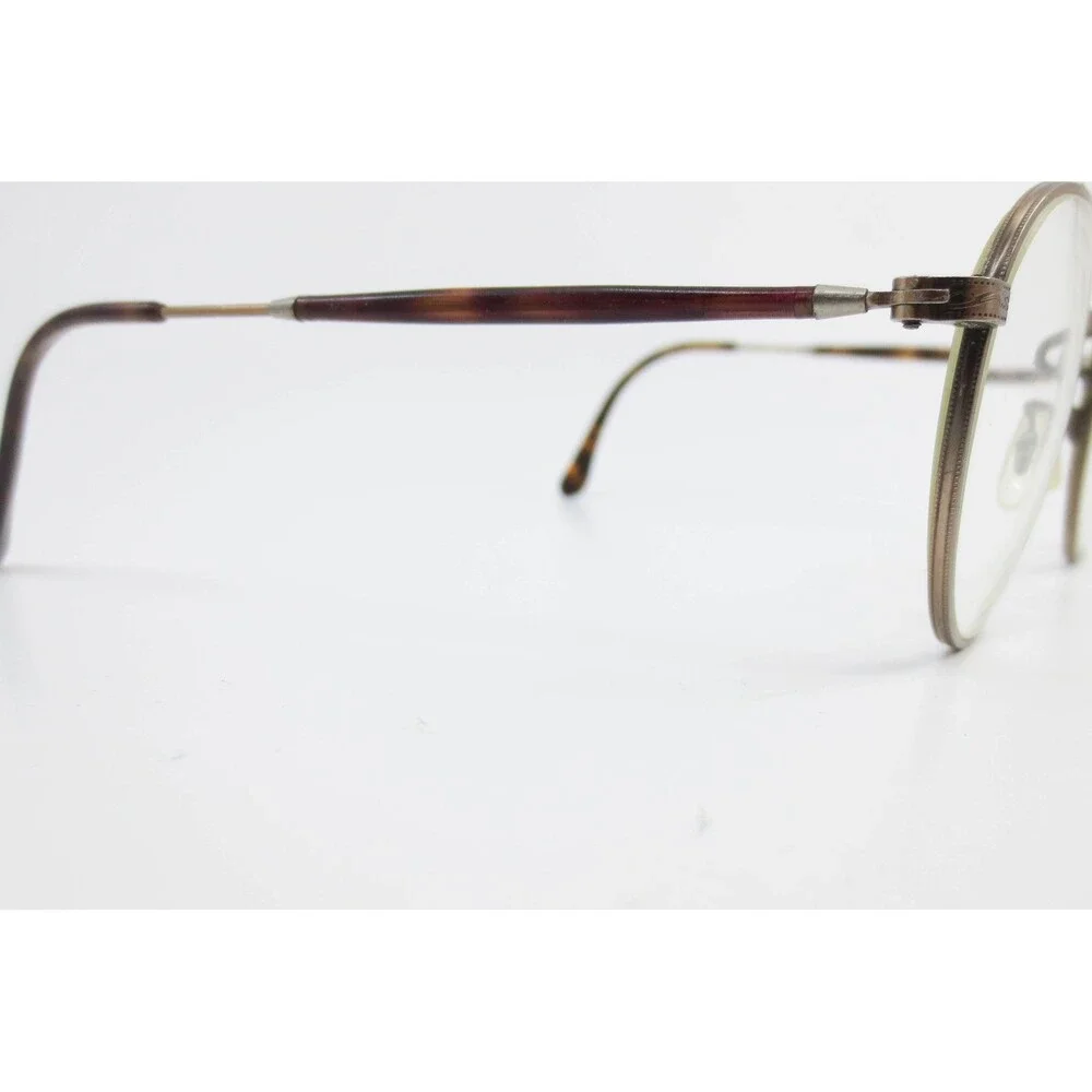 Calvin Klein 127 570 Round Metal Eyeglasses Bronze Tortoise Engraved Frames